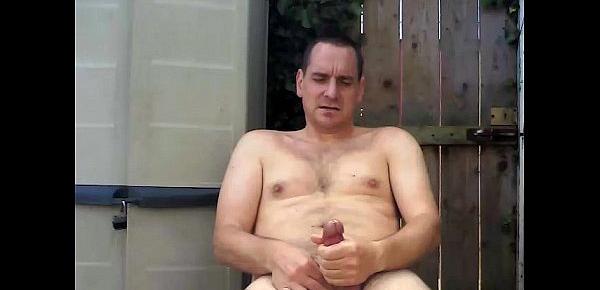  Wanking my oiled cock outdoors in the garden
